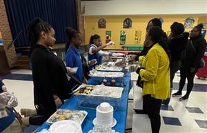 people in line for food